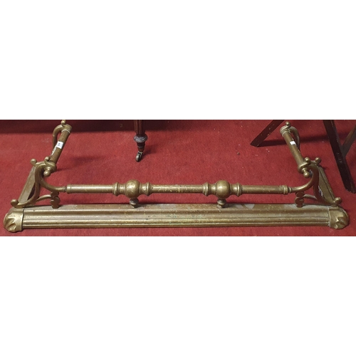 835 - A 19th Century Brass Fender with turned supports. Ope 86 x D 23 cm approx.