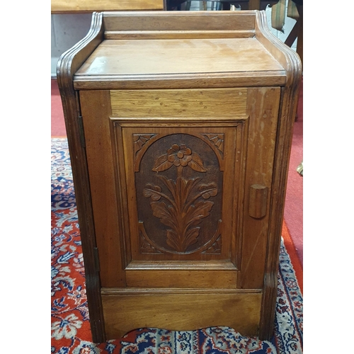 843 - A late 19th Century Walnut single door Cupboard with highly carved door. W 36 x 34 x H 59 cm approx.