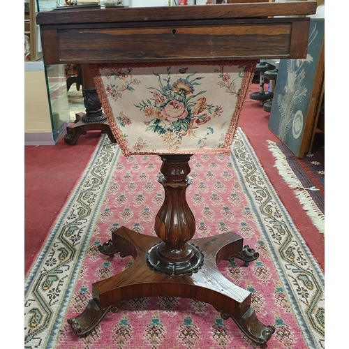 854 - A 19th Century Rosewood Work Table with fitted interior on bulbous tulip reeded support and platform... 