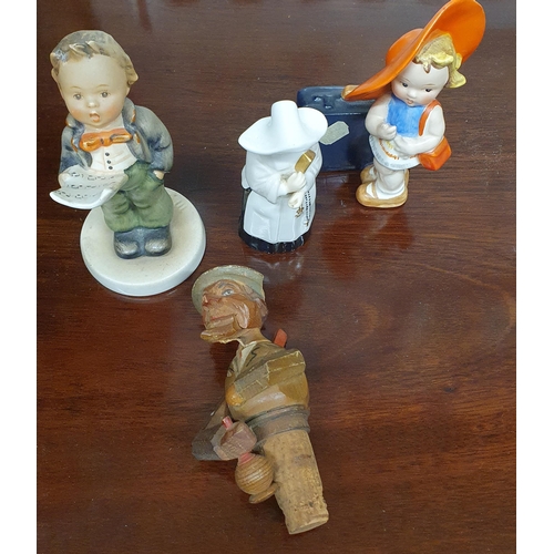 26 - Two Goebel Figure groups along with a Royal Worchester Snuffer and a Vintage Timber Stopper.