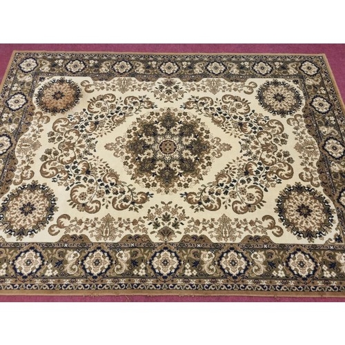 311 - A mustard and cream ground Carpet with multi borders and allover decoration. 287 x 203 cm approx.