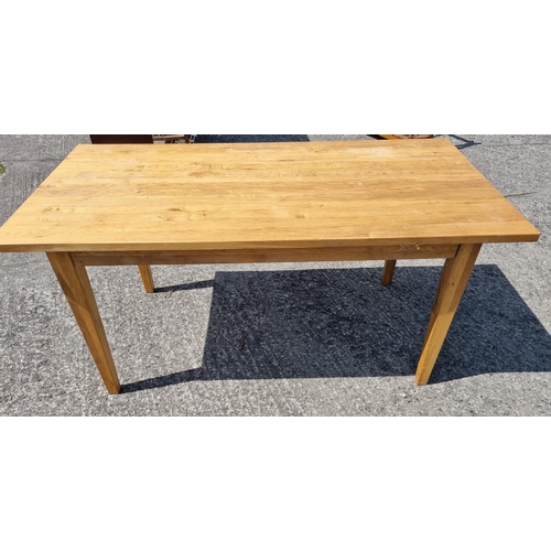 559 - A good modern solid Oak kitchen Table and eight Chairs. #