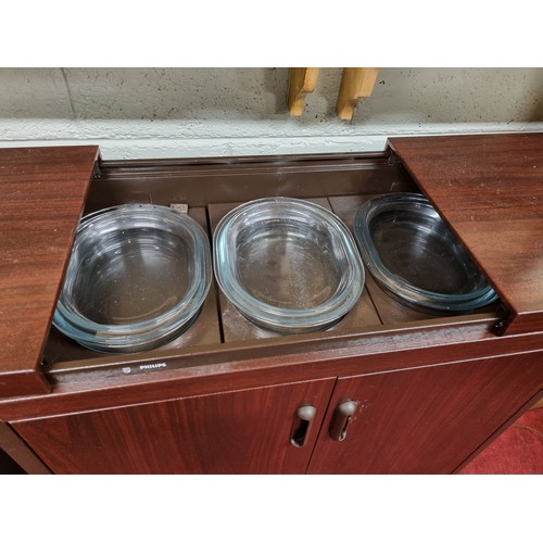 450B - A Phillips food Warmer.
H 70 x 74 x 34 cm approx.
Along with a selection of cookery books, an unusua... 