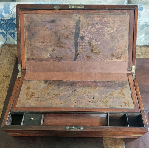 105 - A 19th Century Rosewood and Veneered Campaign Writing Slope.
45 x 24 x H 12 cm approx.