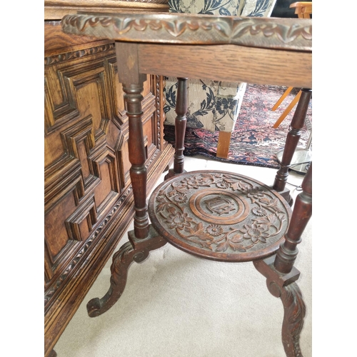 109 - Of really fine quality. A late 19th century Oak Side Table profusely carved with a central Flamingo ... 