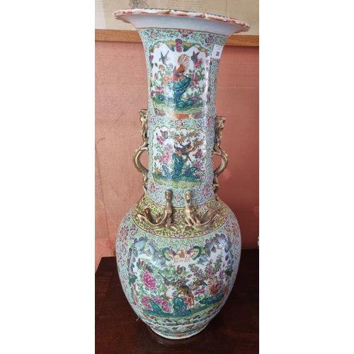 28 - A Magnificent pair of early Oriental Urns of large size with hand painted decoration profusely decor... 