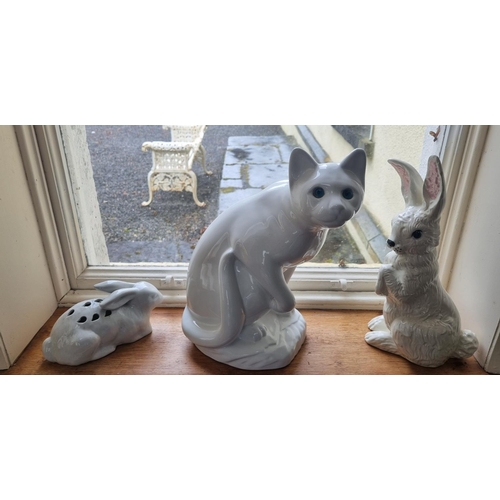 3 - Two Italian Porcelain Cat Figures along with three pottery figures of rabbits.
Tallest being 36 cm a... 