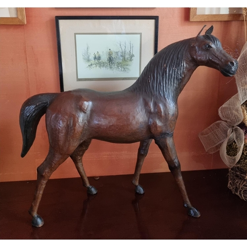 41 - An early 20th Century magnificent large Leather figure of a Horse.
L 67 x H 59 cm approx.