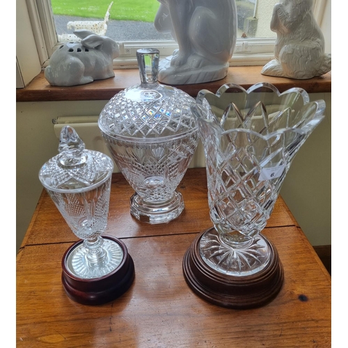 6 - A good Waterford Crystal Vase on a timber stand along with a large bon bon dish and another, both et... 