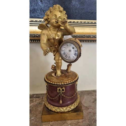 63 - A really good 19th Century Ormolu and Marble Clock with a good enamel dial depicting a cherub standi... 