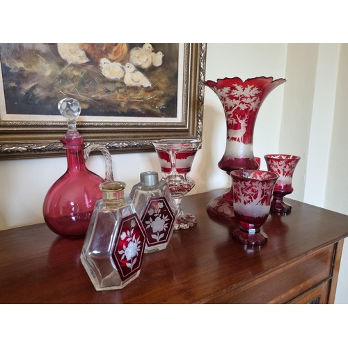 67 - A good quantity of 19th Century and later Cranberry Glass, consisting of a large vase (damaged) and ... 