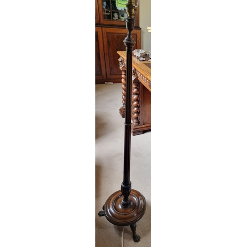 78 - A late 19th early 20th Century Mahogany Standard Lamp on turned platform base and fluted support.
H ... 