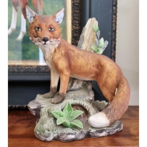 82 - A large Beswick Figure of a Fox (L 23 x H 13  cm approx) along with a Country Artists Kew fine porce... 