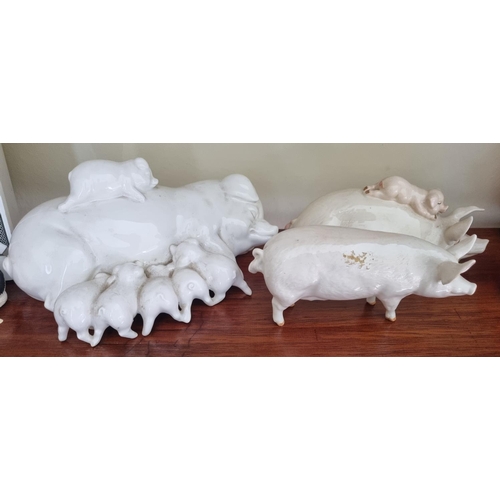 85 - Two Beswick Figures of Pigs along with two others.