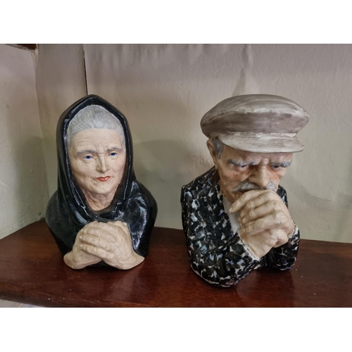 94 - An unusual pair of Limerick China figures 'The Philosopher' and 'The Critic'. Stamped Limerick bone ... 