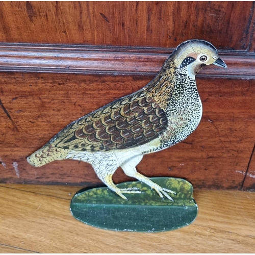 307A - A good painted door Stop in the form of a Bird.  H 24 cm approx.