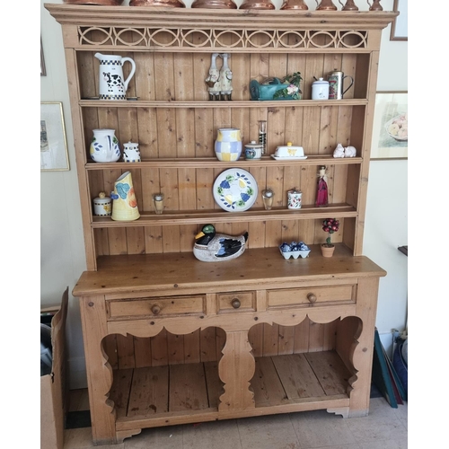 323 - A 20th Century stripped Pine Dresser.
155 x D 46 x H 214 cm approx.