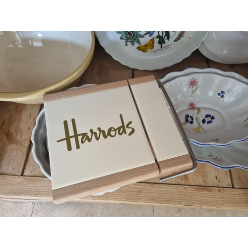 330 - A quantity of Ovenwares along with a Harrods Cheese Board and mixing Bowls.