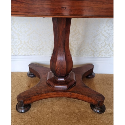 146 - An early 19th Century Rosewood Foldover Card Table on hexagonal shaft platform base and turned suppo... 