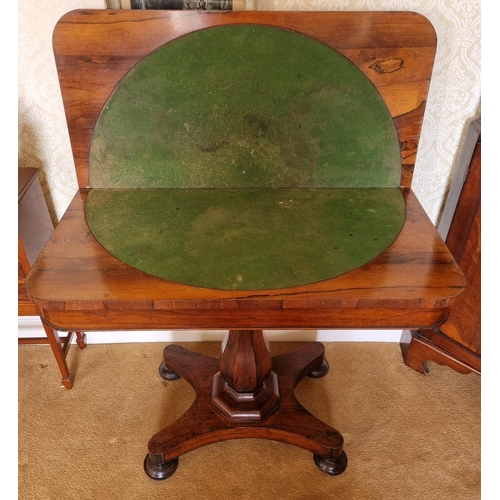 146 - An early 19th Century Rosewood Foldover Card Table on hexagonal shaft platform base and turned suppo... 