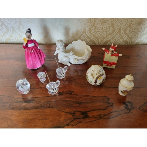 158 - A Royal Doulton Figurine 'Wendy' (H 13 cm approx), along with four Swarovski crystal animals, a pape... 