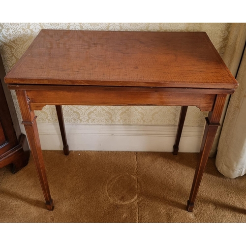 167 - A late 19th Century Mahogany foldover Card Table of neat proportions with inlaid top and square tape... 