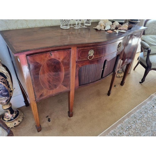 184 - A late 19th Century serpentine fronted Sideboard with single frieze centre over twin tambour doors f... 