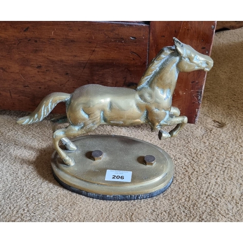 206 - A really good heavy Brass Door Stop depicting a rearing horse. W 24 x H 17 cm approx.