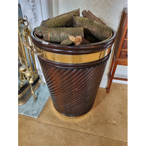 226 - A good Irish Peat/Log Bucket with brass rim reeded ribbed outline and two brass lifting handles.
D 5... 