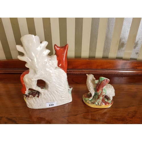 240 - A Staffordshire flatback Figure of a Fox (16 x 25 cm approx) along with a figure of a sheep. Both 19... 