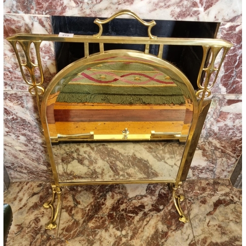 272 - An early 20th Century Art Nouveau Brass Fire Screen with bevelled mirror panel.
W 57 x H 82 cm appro... 