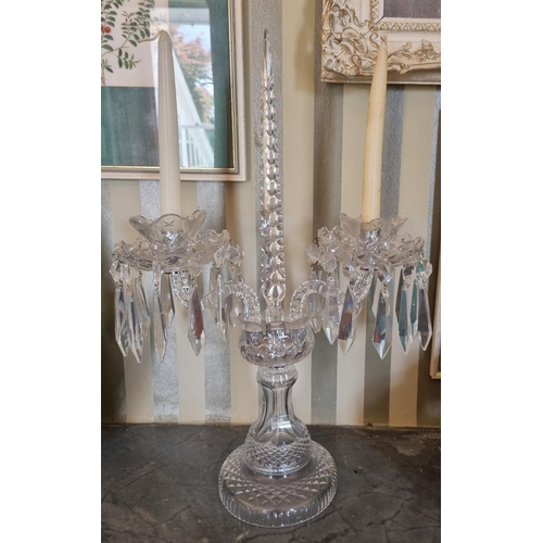 274 - A lovely pair of Waterford Crystal twin branch Candelabra with crystal drops. 34 x 50 cm approx.