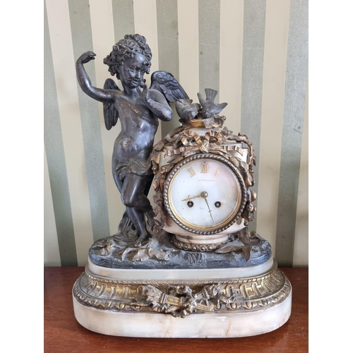 282 - A good 19th Century Bronze and Ormolu French Clock on a marble base depicting a cherub standing besi... 