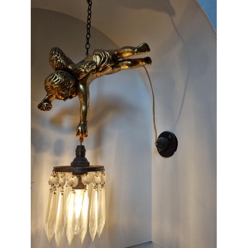 302 - An unusual hanging Light featuring a cherub holding a basket light. Drop 30 cm approx.