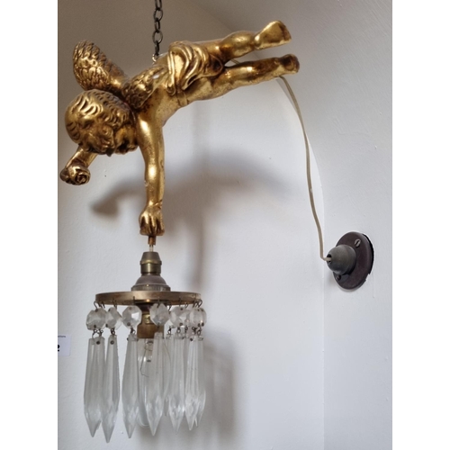 302 - An unusual hanging Light featuring a cherub holding a basket light. Drop 30 cm approx.