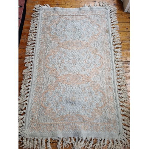 367A - A Cream ground Rug. 115 x 175cm approx.