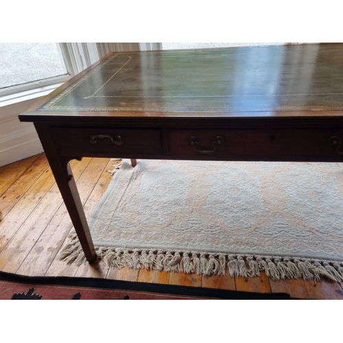 368 - An early 19th Century Writing Table with square tapered supports and triple frieze drawer with brown... 