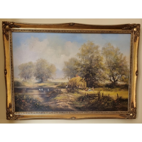 371 - An Oil on Canvas '' Bringing home the Hay''  beside a pond with ducks. Signed LR. In a good gilt fra... 