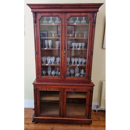 374 - A really good 19th Century two door Bookcase with glazed upper and lower sections on moulded and tur... 