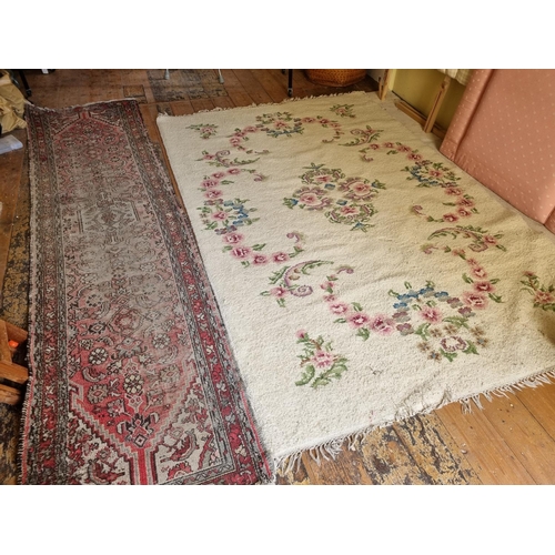 817 - A Persian Runner with some faults along with two cream ground Rugs. 280 x 66 and 240 x 152cm approx.