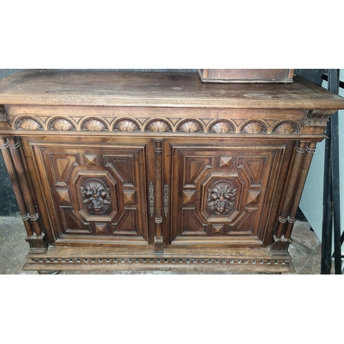 913 - A good late 19th Century Walnut two door Cabinet with a highly carved front. 140 x 47 x H 96 cm appr... 