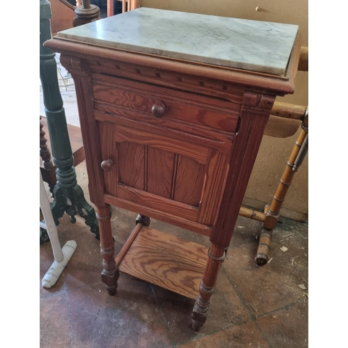 914 - A 19th Century pitch Pine Night Cupboard with white marble top with a single door and single frieze ... 