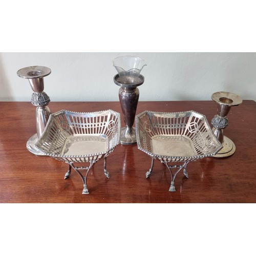 117 - A pair of Birmingham Silver pierced Bon Bon Dishes on stands along with two silver candlesticks and ... 