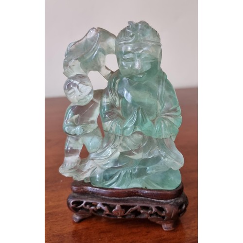 119 - A Jadeite Figure of a Buddha along with an early Netsky,( withdrawn), two Silver Palanquin's and oth... 