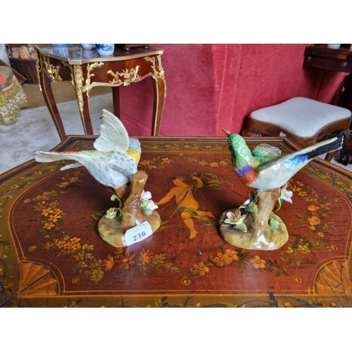 236 - A pair of Staffordshire bone china Bird Figures designed and modelled by J T Jones. H 16 cm approx.