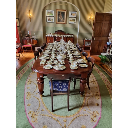 252 - A magnificent 19th Century Dining Table on substantial turned and reeded supports and moulded edge w... 