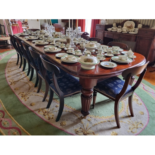 252 - A magnificent 19th Century Dining Table on substantial turned and reeded supports and moulded edge w... 