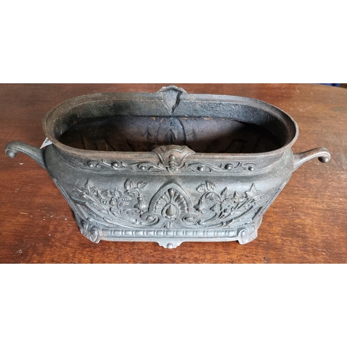 899 - A patented Faure Au Revin cast Iron Planter with a highly embossed exterior. 40 x 17 x H 15  cm appr... 