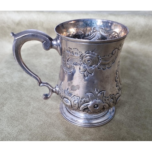 250B - A Georgian London Silver embossed Tankard 1783. 227 gms. approx.