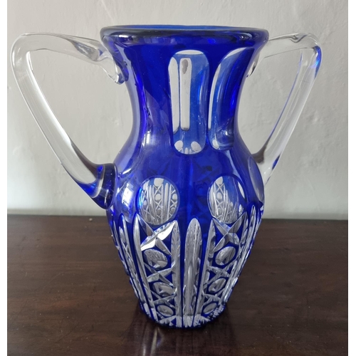 818 - A good and rare twin handled Waterford Crystal Vase in Cobalt Blue ground  24cm high approx.